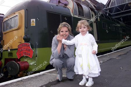 actress-sally-thomsett-with-daughter-charlie-at-kings-cross-station-to-launch-millennium-cavalcade-of-steam-shutterstock-editorial-1033130a.jpg